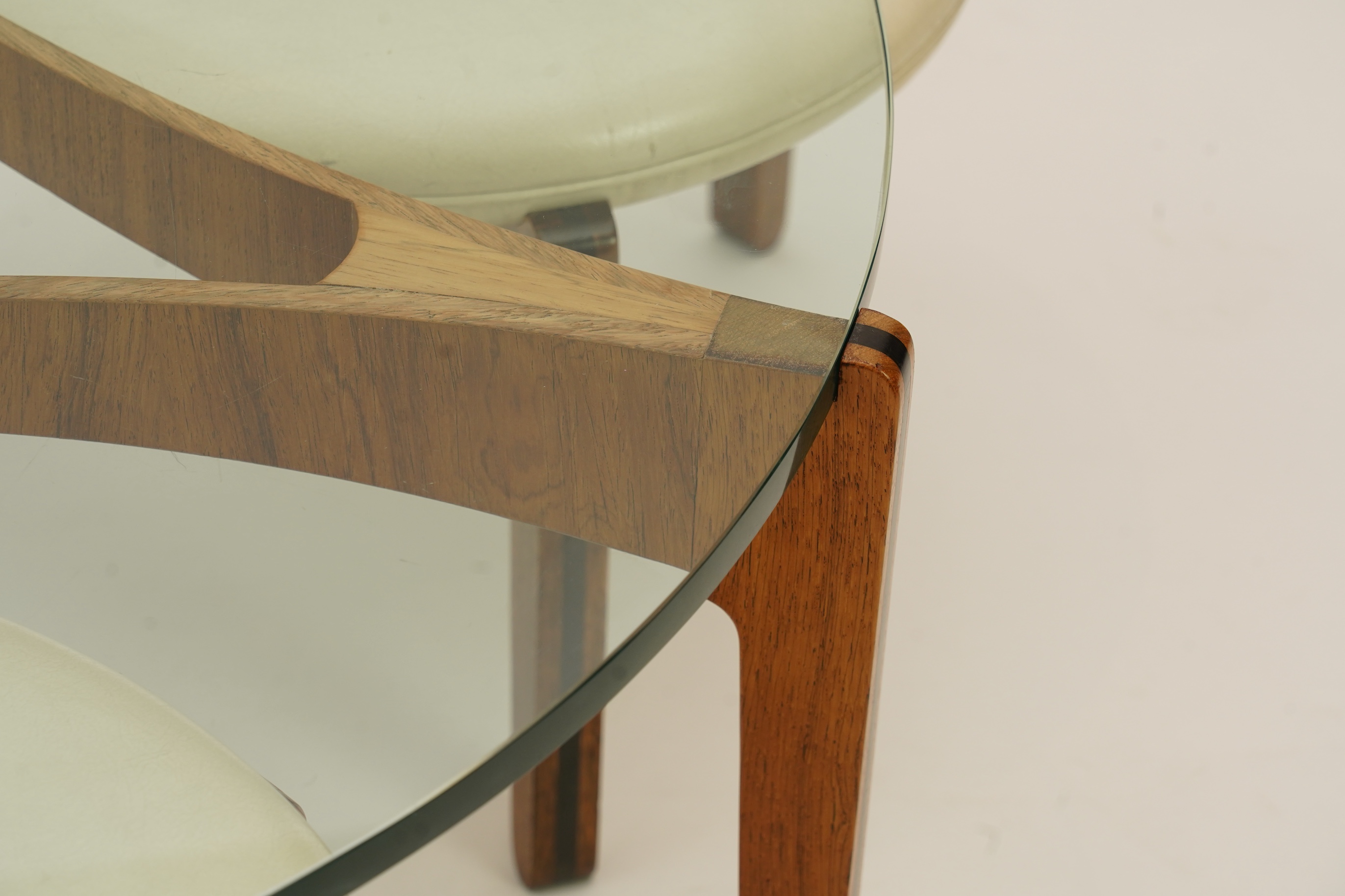 Sven Ellekaer (Danish, 1926-1984) for Christian Linneberg Møbelfabrik: A coffee table and three nesting stools ensuite